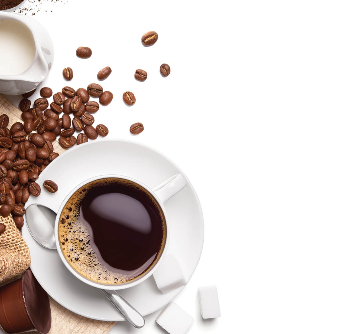 Cup of hot coffee and other ingredients over white background